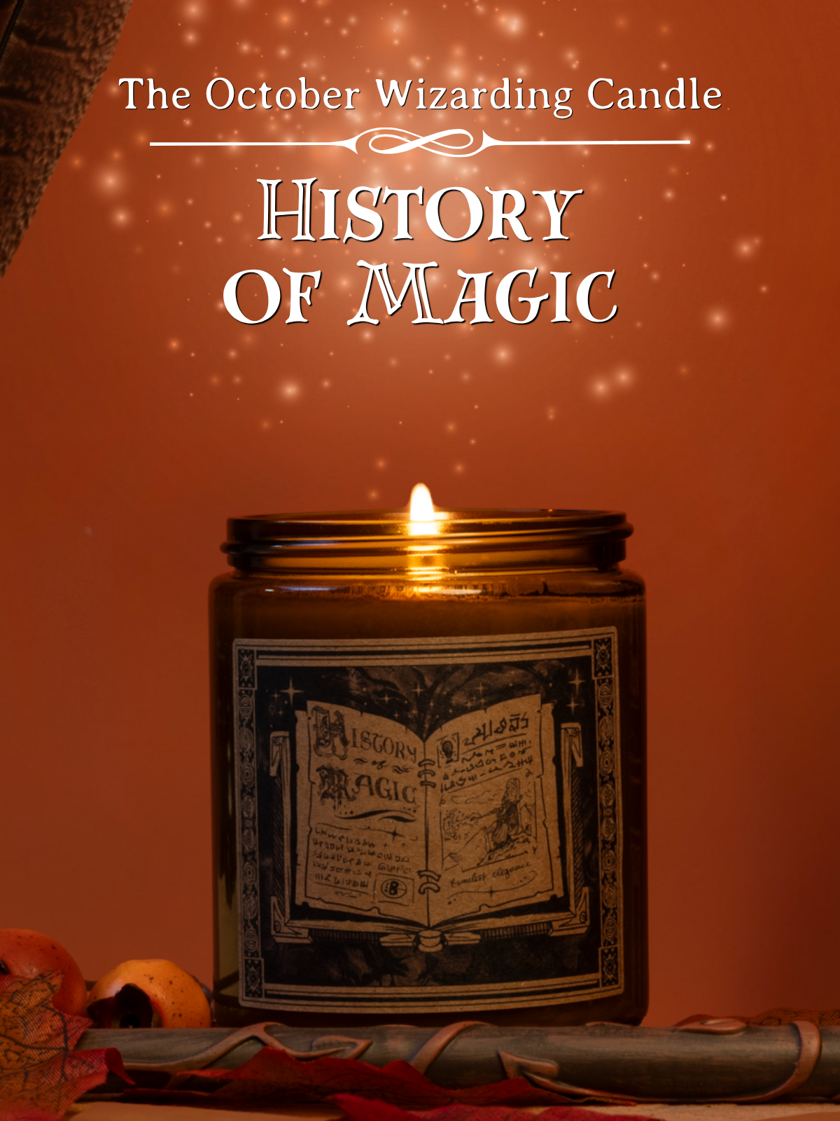 History Of Magic brown glass candle infront of an orange background with fall leaves and a magical wand laid infront.