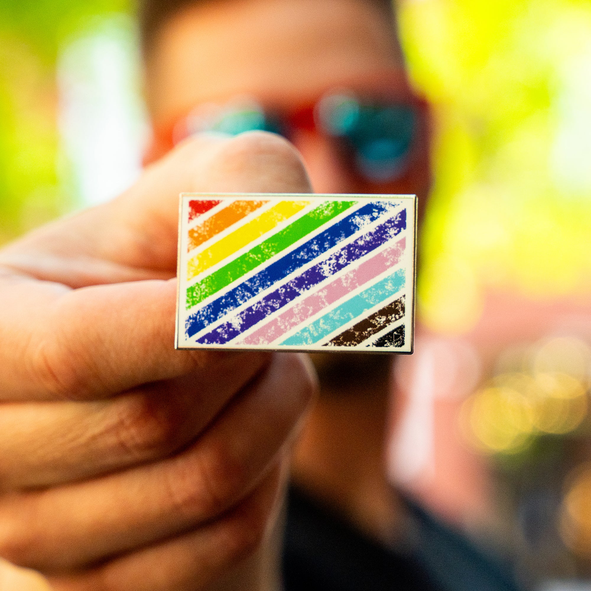 Super Carlin Brother's Mercantile Pride month enamel pin