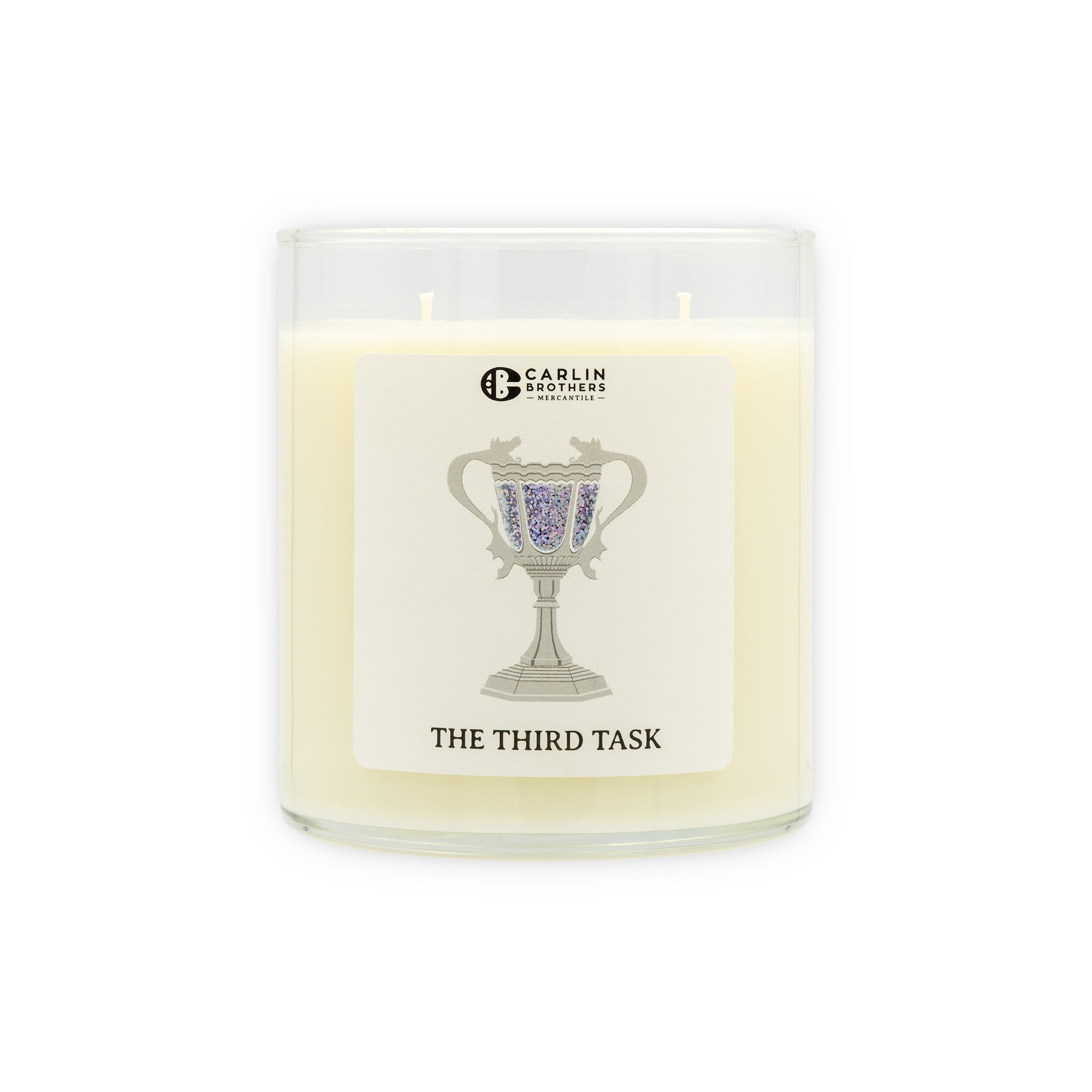 Candle with a decorative label on a white background