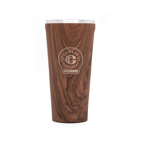 Insulated Corkcicle brand 16-ounce tumbler. Faux-walnut veneer background with Carlin Brothers Coffee Logo engraved in silver